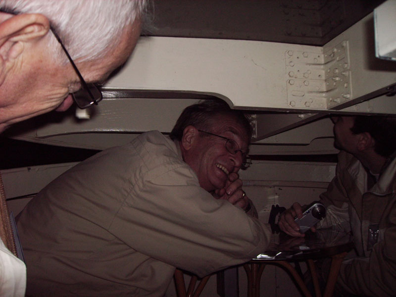 a small bridge, so heads down and roof of the boat down